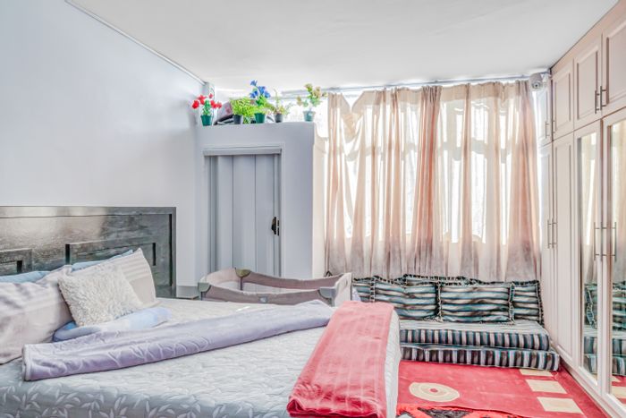 North Beach Apartment For Sale: 3 bedrooms, en-suites, parking, partial sea views.