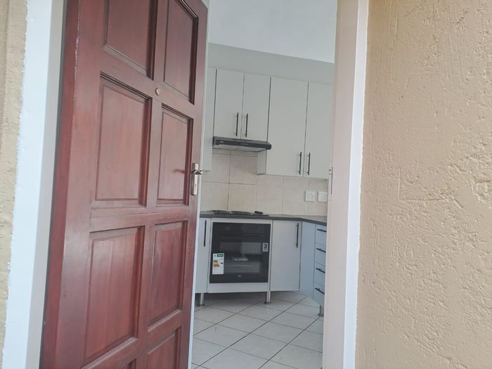 2-Bedroom Apartment To Rent in Sagewood with parking, renovated kitchen, and secure estate.