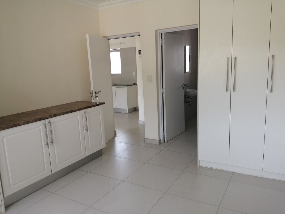 Bedroom with built-in cupboards