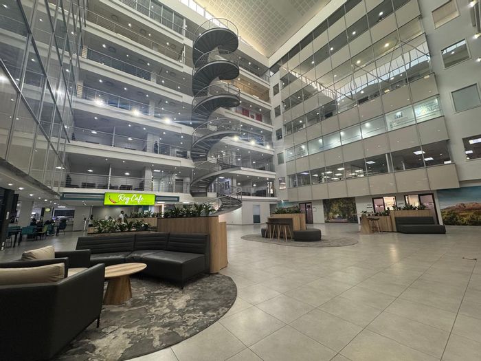 Office to Rent in Bryanston West: Flexible space, central atrium, on-site coffee shop.