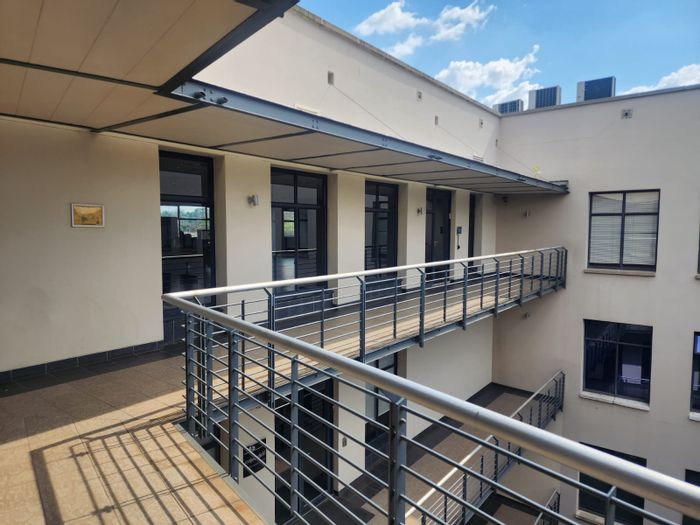 To Rent: Office in Melrose Arch with open-plan layout, 24-hour security, and amenities.