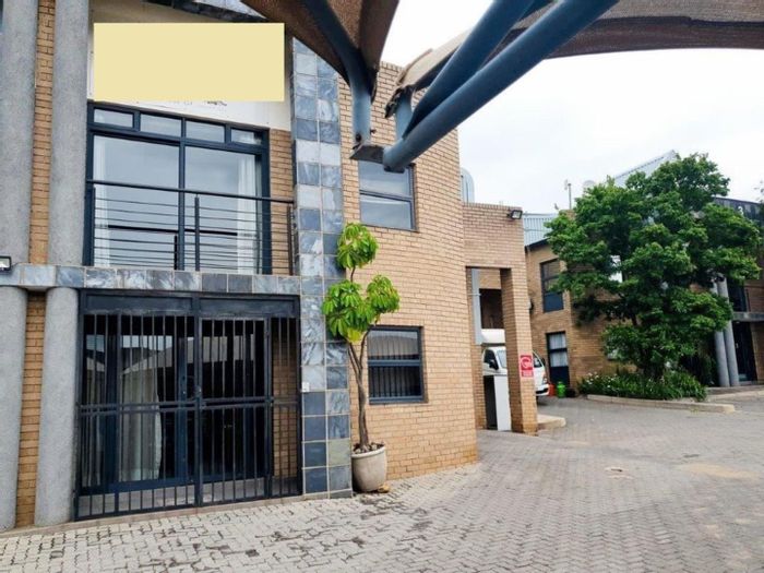 Industrial unit in Barbeque Downs to rent, featuring offices, warehouse, and mezzanine.