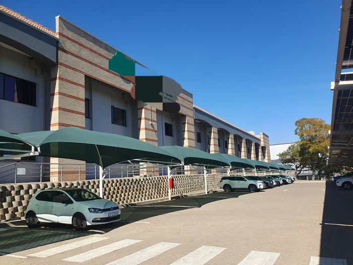 Industrial property in Halfway House to rent, featuring extensive office and warehouse space.