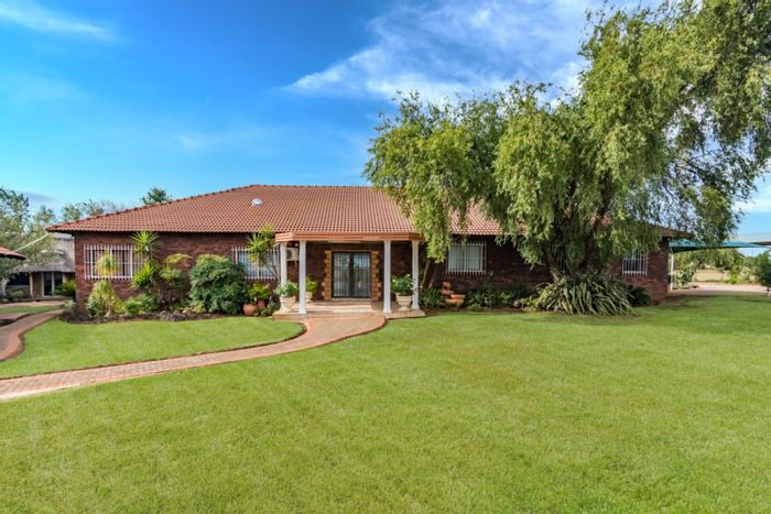 Hillside Farm For Sale: 4 houses, solar power, boreholes, and expansive gardens.