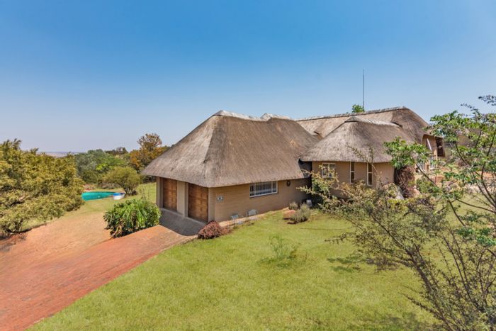 For Sale: 2.2-hectare small holding in Protea Ridge with main house, cottage, and amenities.