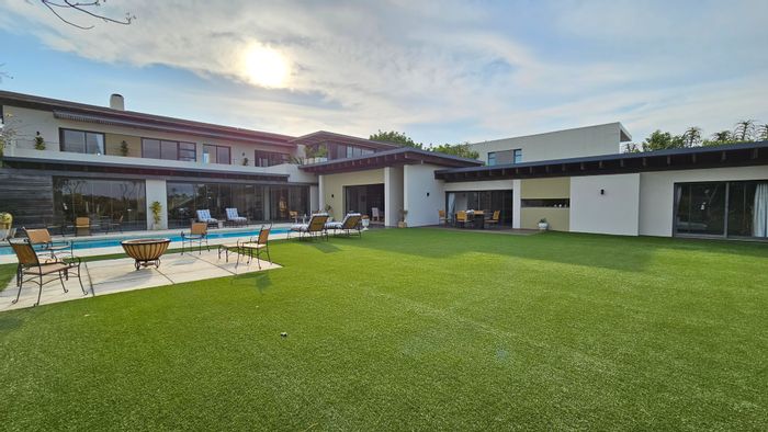 For Sale: House in Hawaan Forest Estate with 5 bedrooms, gourmet kitchen, and privacy.