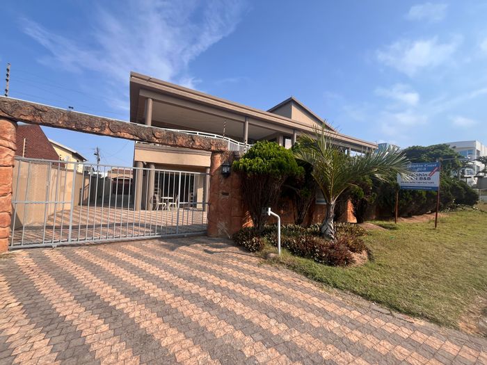 Glenashley Guest House For Sale: 13 en-suite rooms, beach access, investment potential.