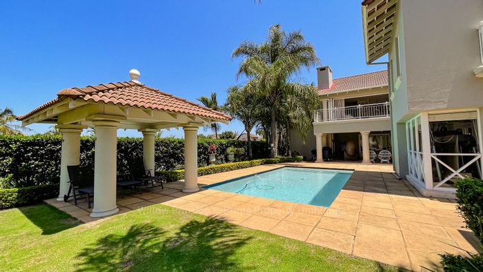 For Sale: Spacious 6-bedroom house in Umhlanga Central with pool and office.