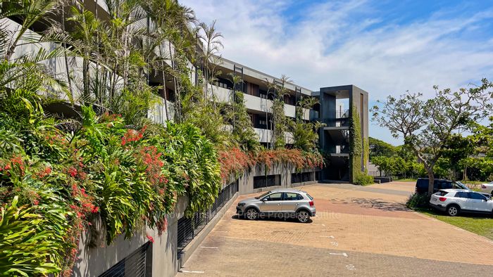 For Sale: Apartment in Ballito Central with private balcony and clubhouse amenities.
