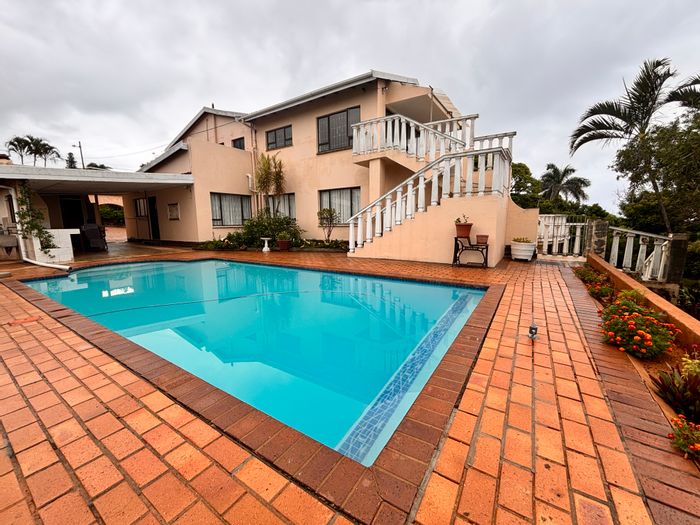 For Sale: House in Herrwood Park with 10 bedrooms, pool, and rental potential.