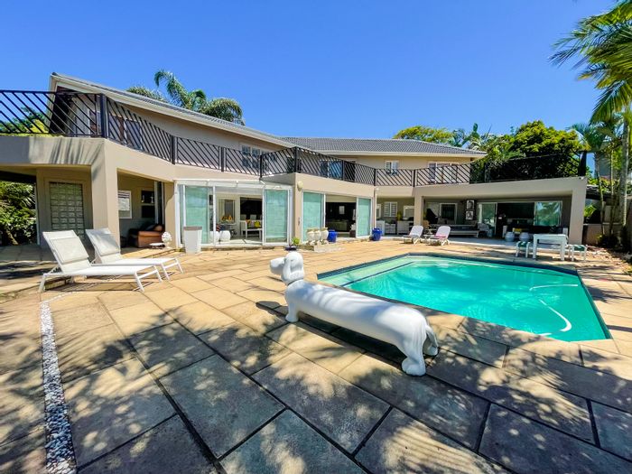 For Sale: 4-bedroom house in Umhlanga Central with ocean views and garden.
