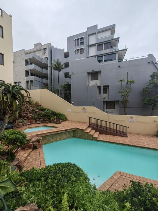 For Sale: Apartment in Umhlanga Central with pool, parking, and beachfront access.