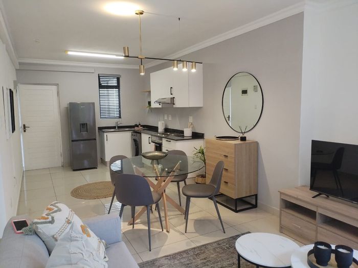 For Sale: 2-bedroom apartment in Umhlanga Ridge with secure access and pool amenities.