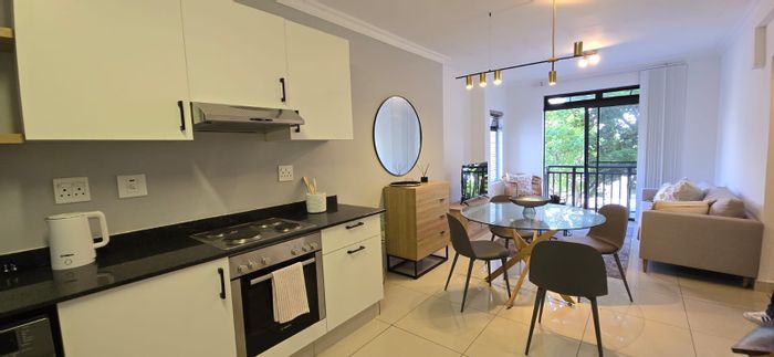 For Sale: 2-bedroom apartment in New Town Centre with balcony and in-unit laundry.