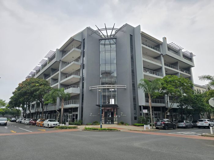 For Sale: 2-Bedroom Apartment in Umhlanga Ridge with private backyard and secure parking.