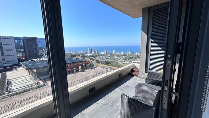 For Sale: Apartment in Umhlanga Ridge with amenities, security, and coastal views.