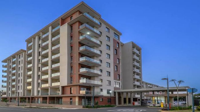 Apartment For Sale in New Town Centre: Scenic views, pool access, covered parking.