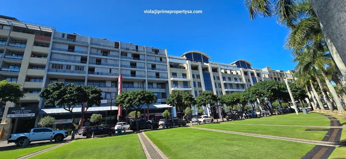 For Sale: Apartment in New Town Centre, 2 beds, balcony, secure parking.