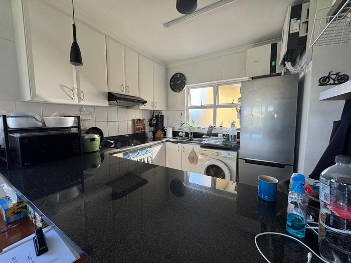 Two-bedroom apartment in New Town Centre, To Rent, with parking and storage.
