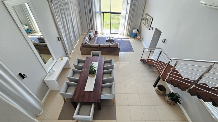Spacious 4-bedroom apartment with bar, balcony, and waterfront access in Point Waterfront.