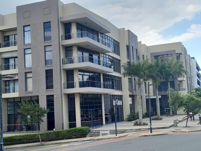 For Sale: 2-bedroom apartment in New Town Centre with balcony and parking.
