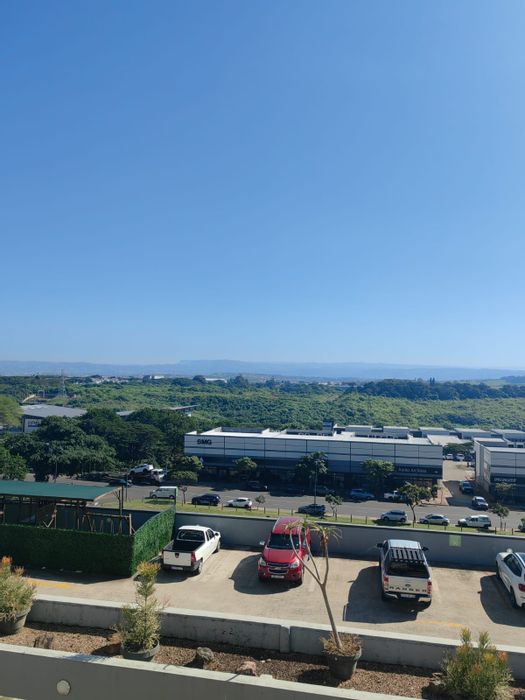 For Sale: Apartment in Umhlanga Ridge with 2 beds, security, and balcony access.