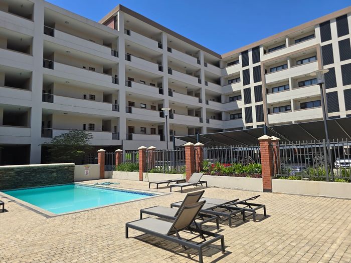 For Sale: Apartment in New Town Centre with pool, gym, and secure parking.