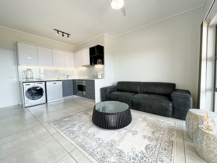 1-Bedroom Apartment To Rent in Izinga Estate with sea-facing balcony and secure parking.