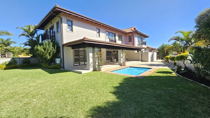 For Sale: 3-bedroom townhouse in Izinga Ridge with pool, garage, and balconies.