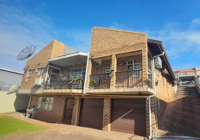 For Sale: House in Lotus Park with gym, rental unit, and secure access.