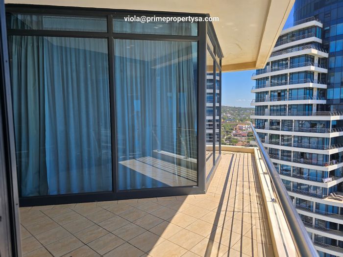 Umhlanga Central Apartment To Rent: 3 beds, sea views, premium amenities, spacious living.