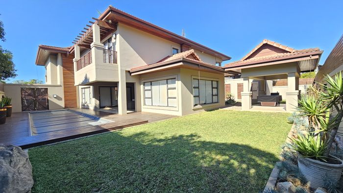 For Sale: House in Izinga Estate with 5 bedrooms, cinema room, and eco-friendly features.