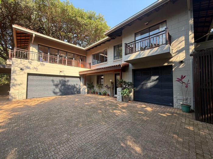 House To Rent in Port Zimbali Estate: 4 bedrooms, pool, golf access, security.