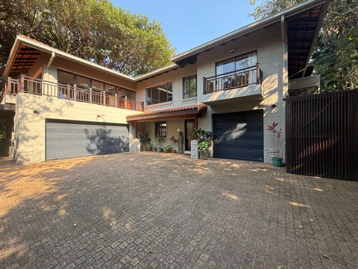 For Sale: House in Port Zimbali Estate with pool, golf access, and guest suite.