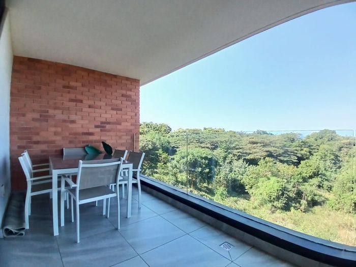 Sibaya Precinct Apartment For Sale: 2-bed, ocean views, pool, beach access.