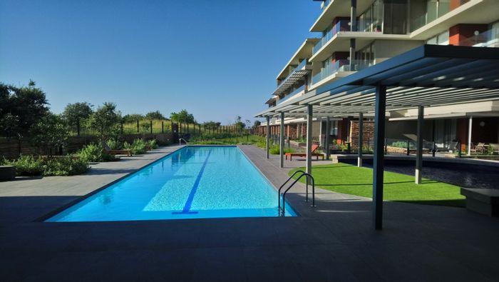 For Sale: Apartment in Sibaya Precinct with pool, security, and private patio.