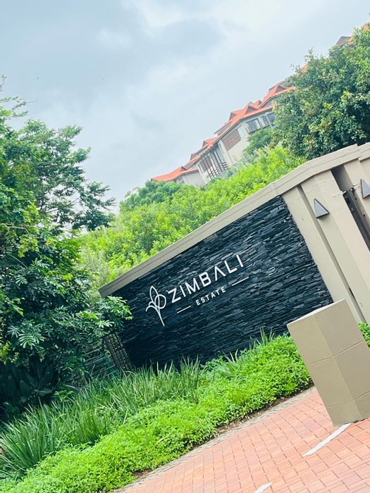 1-Bedroom Apartment To Rent in Zimbali with balcony, golf course, and beach access.