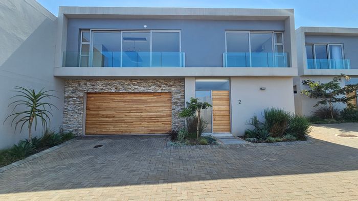 La Lucia Townhouse For Sale: 3 Bedrooms, spacious living, landscaped yard, covered parking.