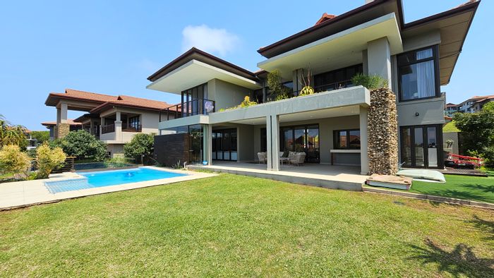 Izinga Estate House For Sale: 4 beds, heated pool, garden, gated community amenities.