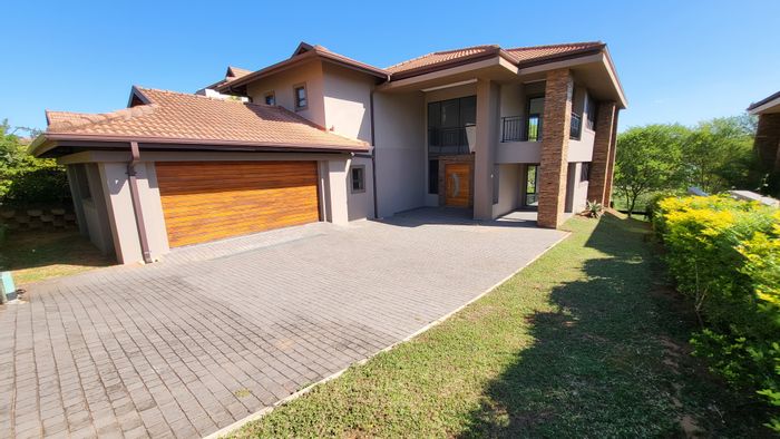 For Sale: House in Izinga Estate, 4 beds, 4 baths, double garage, landscaped garden.