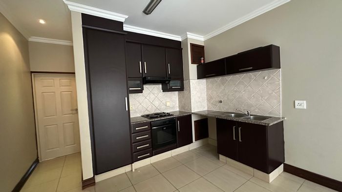 1 Bedroom Apartment To Rent in New Town Centre with Open-plan Living and Parking.