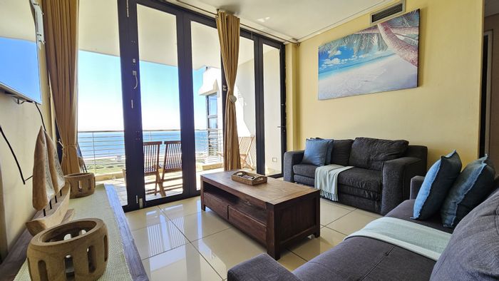 For Sale: Apartment in Point Waterfront with ocean views, pool access, and Airbnb potential.