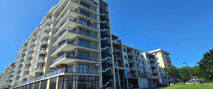 For Sale: Apartment in New Town Centre with secure parking, pool, and gym access.