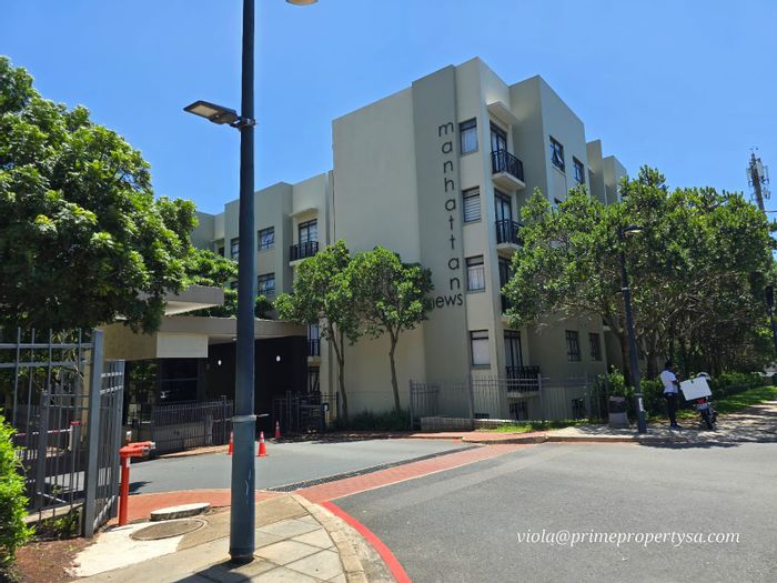 For Sale: 2-Bedroom Apartment in New Town Centre with Private Garden and Parking.