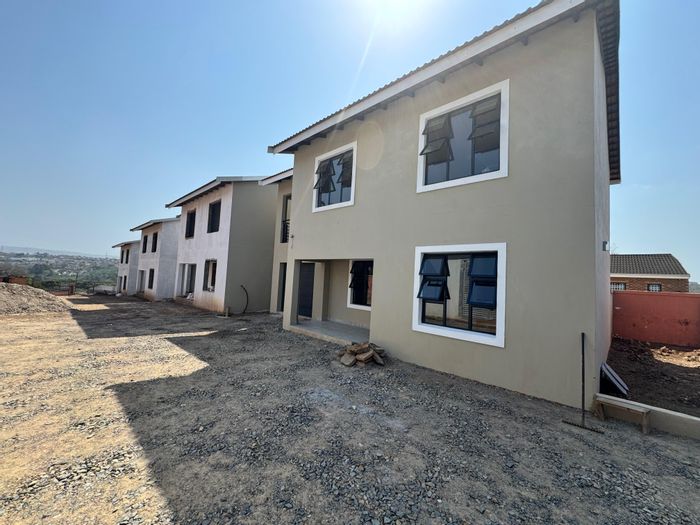 Clayfield Townhouse For Sale: 3 beds, open-plan living, secure complex, no transfer duties.