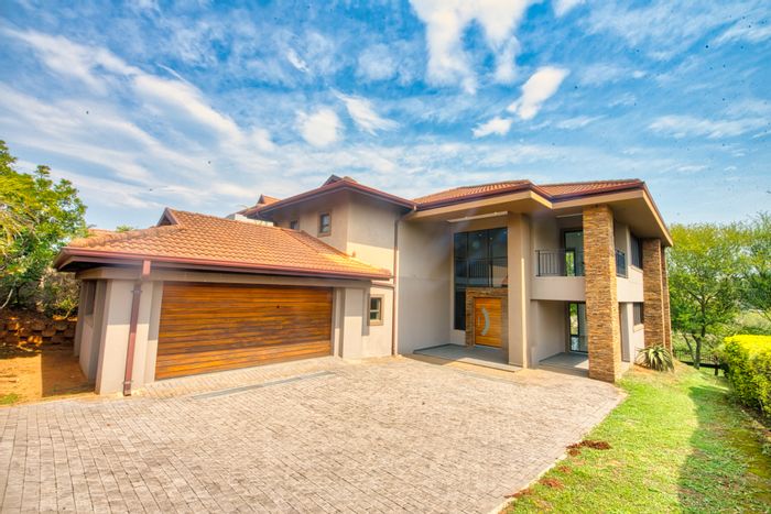 For Sale: House in Izinga Ridge with 4 bedrooms, security, and landscaped garden.
