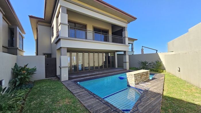For Sale: Izinga Estate Townhouse with lift, pool, clubhouse, and sea views.