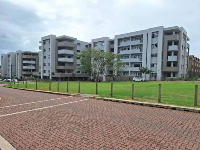 For Sale: Apartment in Umhlanga Ridge with 2 beds, secure parking, and balcony.