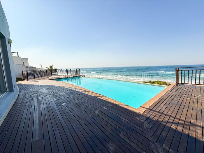 For Sale: Beachfront House in Tinley Manor with pools, cinema, and BnB rights.