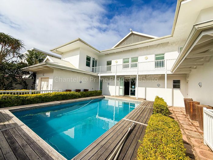 Beachfront House For Sale in Tinley Manor with direct beach access and ocean views.